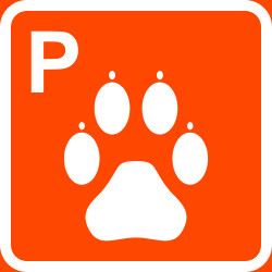 Oranssi-valkoinen koiraparkki -kyltti