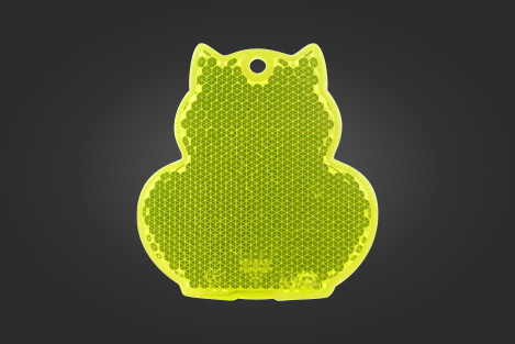 Keltainen kissan muotoinen prismaheijastin