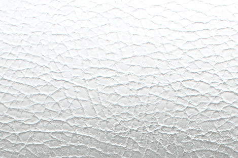 Nahan kuvioinen laminaatti